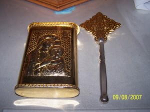 SMY_2176 In all our Churches we keep a "Bible" in a metal cover on the altar. But in fact, the tradition is to keep just the four Gospels in that casing, not the whole Bible, or even the whole New Testament. Why only the Gospels? Most likely, this tradition began when manufacturing a whole Bible was simply impractical and people generally used "part-Bibles"; books with only one Gospel, or only the Letters of St Paul, or, as in this case, only the Four Gospels.