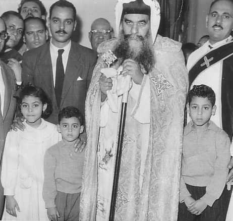 Fr Mina Nematalla and his family as a layman, not long before his ordination, together with his uncle, Pope Kyrollos VI.